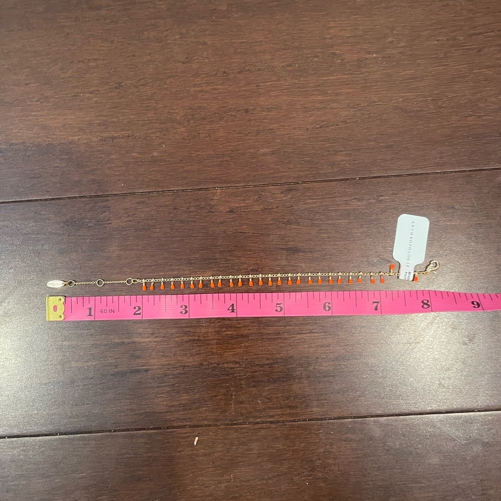 nwt serefina Gold and coral fringe Bracelet